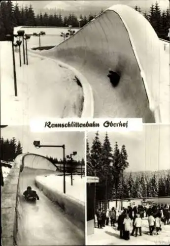 Ak Oberhof im Thüringer Wald, Rennschlittenbahn  Schlittenrennen, Winterlandschaft, Menschenansam