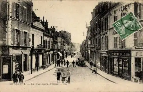 Ak Breux Essonne, Straße, Ansicht, Alte Gebäude, Menschen, Fahrzeuge