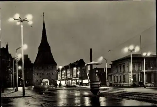 Ak Hansestadt Rostock, Steintor bei Nacht