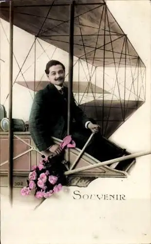 Ak Mann mit Blumenstrauß, Flugzeug