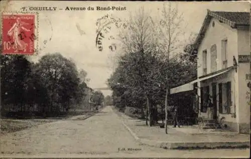 Ak Couilly Seine et Marne, Avenue du Rond-Point, Landschaft, Gebäude, Bäume, Straßenansicht, 