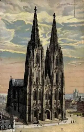 Ak Köln am Rhein, Kölner Dom, imposante Westseite, gotische Architektur, Himmel mit Wolken