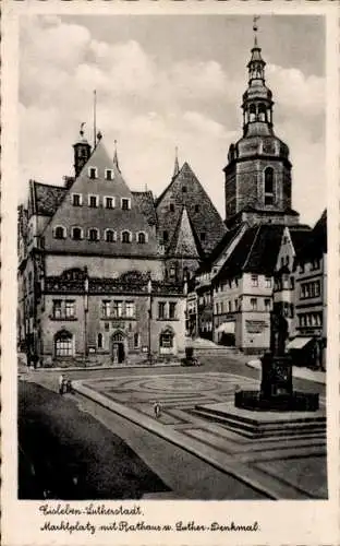 Ak Lutherstadt Eisleben in Sachsen Anhalt, Marktplatz mit Rathaus,Luther Denkmal
