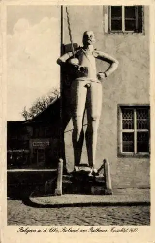 Ak Belgern Schildau in Nordsachsen, Blick auf den Roland am Rathaus, Geschäft Wilhelm Müller
