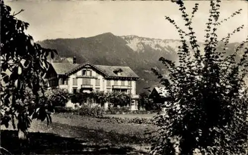 Ak Wilderswyl Wilderswil Kanton Bern Schweiz, Hotel Jungfrau, Berglandschaft, Bäume, Wolken