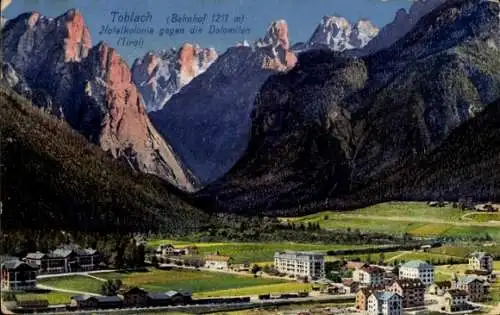 Ak Toblach Dobbiaco Südtirol, Berglandschaft, Bahnhof, Hotelkolonie, Dolomiten