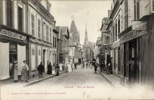 Ak L'Aigle Laigle Orne, Straße mit Häusern, Menschen, Pferd, Geschäften,  Architektur