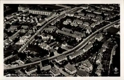 Ak Freiburg im Breisgau, Luftaufnahme von Freiburg, Universitäts-Stadion, Wohngebiete, Straßen, 6