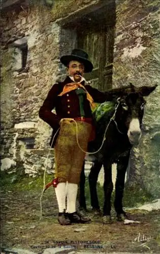 Ak Bessans Savoie, Mann mit Esel, traditionelle Kleidung