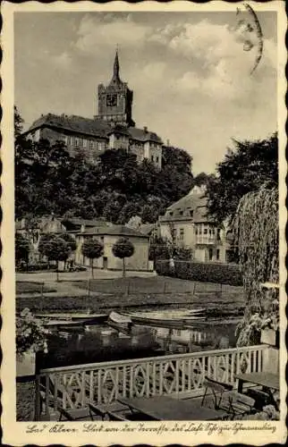 Ak Kleve am Niederrhein, Blick auf die Schwanenburg, Terrasse des Café Schr., Boote am Wasser