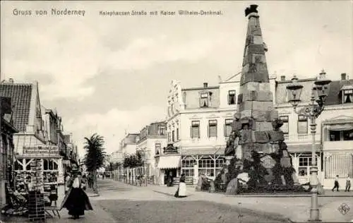 Ak Nordseebad Norderney Ostfriesland, Kalephausen Straße mit Kaiser Wilhelm-Denkmal