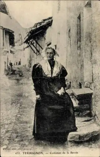 Ak Termignon Savoie, Eine Frau in traditioneller savoyischer Tracht