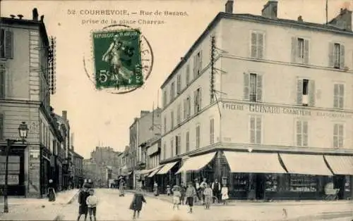 Ak Courbevoie Hauts de Seine, Straße Rue de Bezons, Platz Charras, Blick auf Gebäude, Werbung