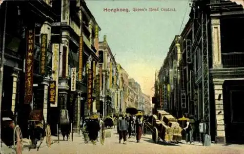 Ak Hongkong China, Viertel mit Geschäften, Rickschas und Menschen, beschriftete Schilder