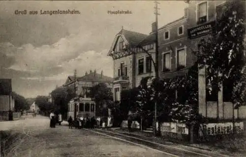 Ak Langenlonsheim an der Nahe Pfalz,  mit Straßenansicht, Tram, Häusern, Restaurant