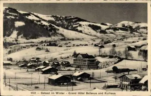 Ak Gstaad Saanen Kanton Bern, Winterlandschaft, Grand Hôtel Bellevue, Kurhaus, schneebedeckte Ber