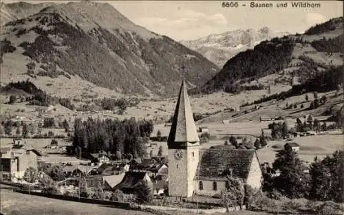 Ak Saanen Kt. Bern Schweiz, Blick auf den Ort und das Wildhorn, Kirche
