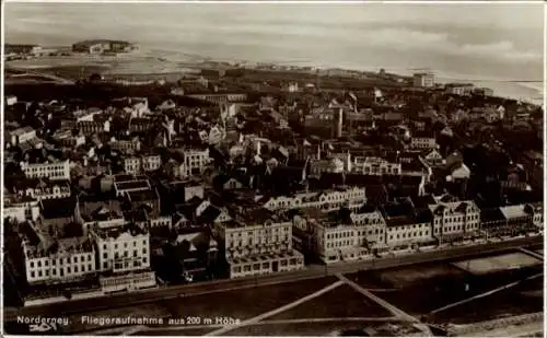 Ak Norderney in Ostfriesland, Blick auf den Ort, Häuser, Fliegeraufnahme 