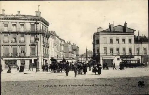 Ak Toulouse Haute Garonne,  Rue de la Porte St-Etienne, Colonne Dupuy,  Szenerie