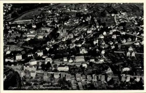 Ak Siegen in Westfalen, Luftbildaufnahme von  Häuser, Landschaft,  Gebäude