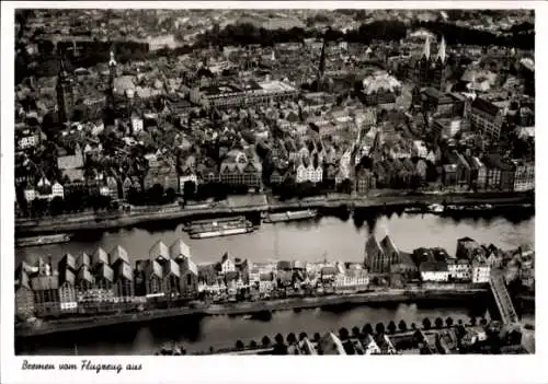 Ak Hansestadt Bremen, Luftaufnahme von  Fluss und Gebäude, schwarz-weiß Fotografie