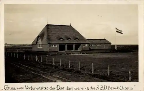 Ak Insel Sylt in Nordfriesland, Häuser mit Reetdach, Flagge, Schriftzug: Gruss vom Verbandstag de