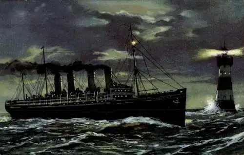Ak Dampfschiff passiert einen Leuchtturm bei Nacht