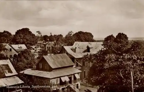 Ak Monrovia Liberia, Südwestlicher Teil von Monrovia, Häuser und Vegetation, historische Aufnahme