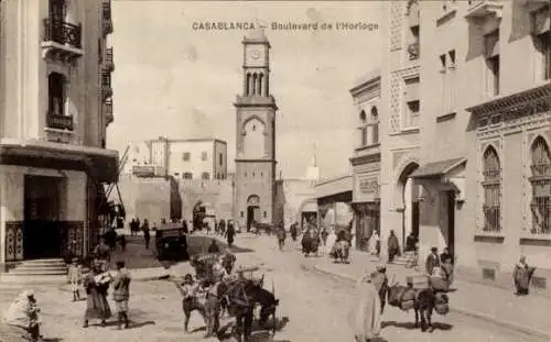 Ak Casablanca Marokko, Boulevard de l'Horloge, Uhrturm, Straßenleben, historische Architektur