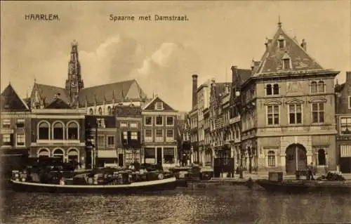 Ak Haarlem Nordholland Niederlande, Stadtansicht von  Spaarne mit Damstraat, historische Archi...