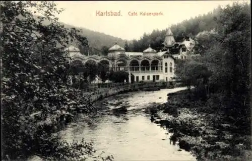 Ak Karlsbad in Baden, Café Kaiserpark, Fluss, Bäume,  Architektur