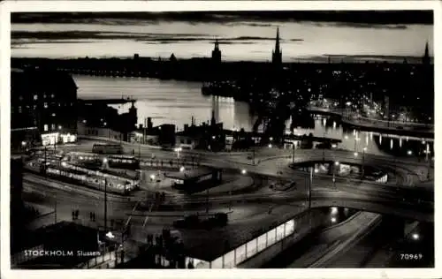 Ak Stockholm Schweden, Panoramaansicht von Slussen, nächtliche Beleuchtung, historischer Charme