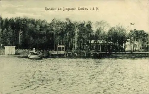 Ak Storkow in der Mark, Karlslust am Dolgensee, Boot im Wasser, Waldgebiet, Gebäude
