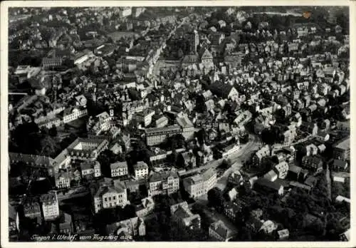 Ak Siegen in Westfalen, Luftaufnahme von  westfälische Landschaft, Häuser und Straßen