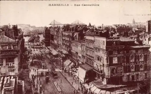 Ak Marseille Bouches du Rhône, Stadtansicht, Rue Cannebière, Geschäfte,  Architektur
