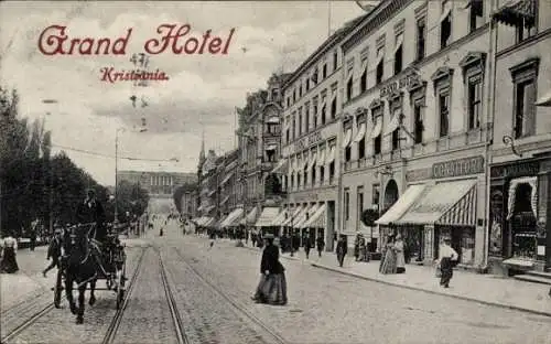 Ak Kristiania Christiania Oslo Norwegen, Grand Hotel, Straße mit Pferdewagen und Passanten,  Arch