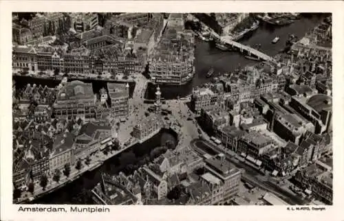 Ak Amsterdam Nordholland Niederlande, Luftaufnahme von Muntplein, viele Gebäude, Kanäle, Boote