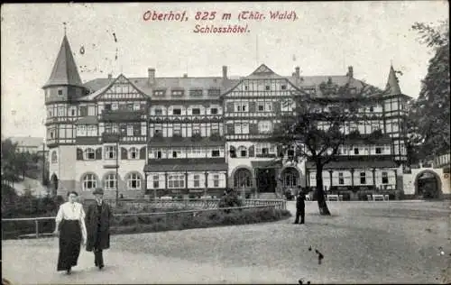 Ak Oberhof im Thüringer Wald, Schlosshotel,  Architektur, Spaziergänger, Parkanlage