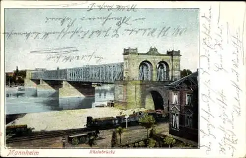 Ak Mannheim in Baden,  Rheinbrücke, r Brückenbau, Industriegebäude