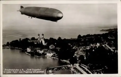 Ak Friedrichshafen am Bodensee, Luftschiff LZ 127 Graf Zeppelin, Fliegeraufnahme