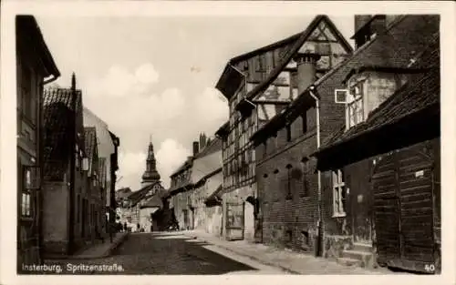 Ak Tschernjachowsk Insterburg Ostpreußen, Luxenberg, Spritzenstraße,  Architektur, Wolken, Straße