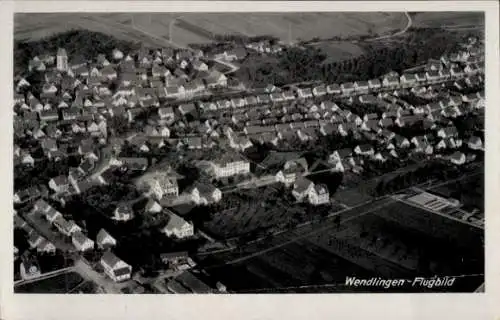 Ak Wendlingen am Neckar Baden Württemberg, Luftaufnahme von  zahlreiche Wohnhäuser und Felder
