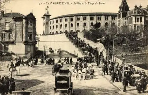 Ak Donostia San Sebastian Baskenland, Historic Plaza de Toros, Menschen, Gebäude, Treppe, Autos