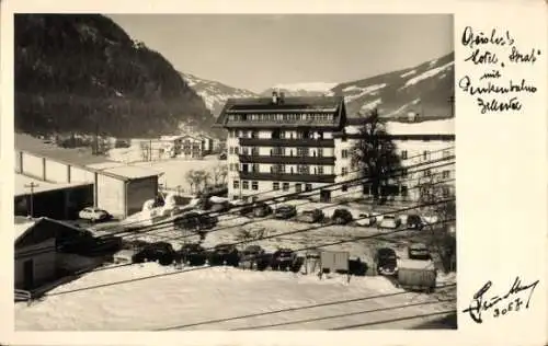 Ak Finkenberg in Tirol, Schneebedeckte Landschaft, Gebäude, Autos, Bergkulisse, Winter