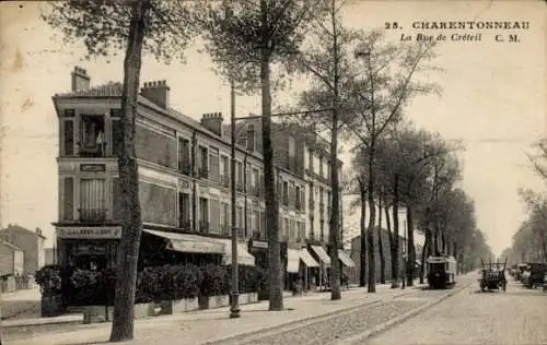 Ak Charenton le Pont Val de Marne,  zeigt die Rue de Créteil, Gebäude, Straßenbahn, Bäume