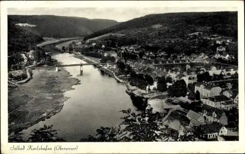 Ak Bad Karlshafen an der Weser, Luftansicht von  Weser, Brücke, Altstadt