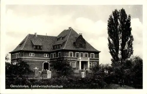 Ak Gerolzhofen in Unterfranken, Landwirtschaftsschule  Gebäude, Bäume, Himmel