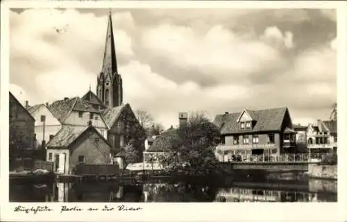 Ak Buxtehude in Niedersachsen, Bild einer Stadtansicht, Kirche, Häuser, Wasser, Wolken