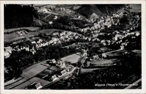 Ak Wippra Sangerhausen am Harz, Luftbild von  Häuseransicht, ländliche Umgebung