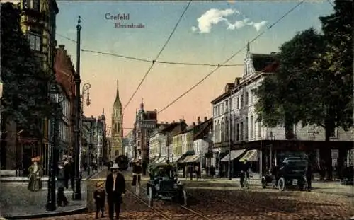 Ak Krefeld am Niederrhein, Rheinstraße, Passanten, Geschäfte, Autos